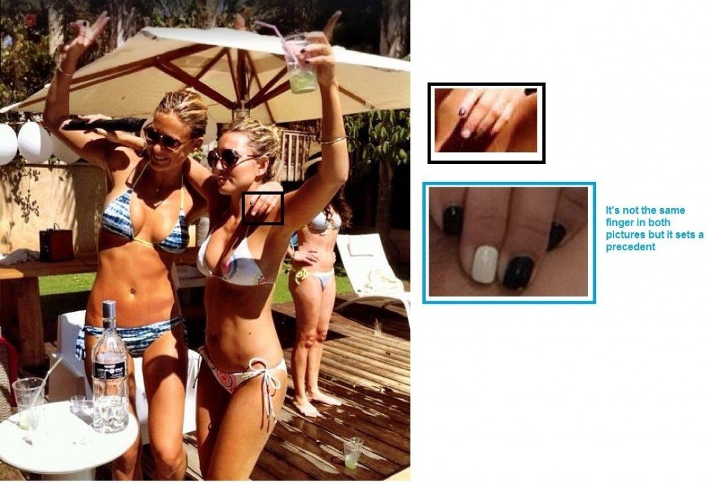 Bar-Refaeli-Foto-Beweise-Schwarzer Nagellack mit weißem Nagellack auf einem Fingernagel